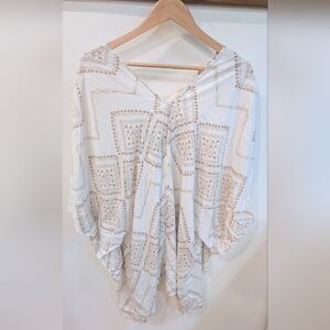 White and Tan Patterned Poncho